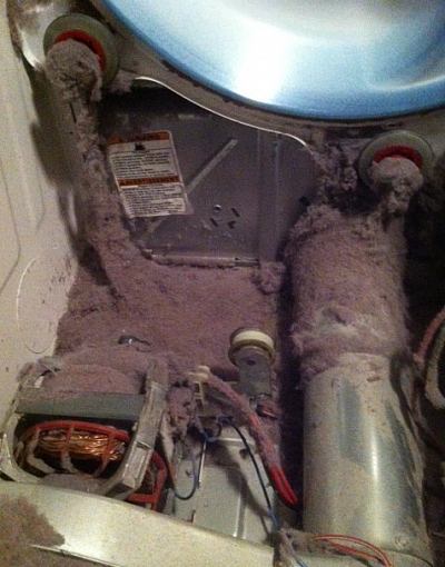 Lint Inside Dryer Cabinet